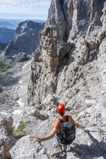 Mountaineers on the Bocchette Centrale band trail, via ferrata in the Brenta Mountains, Brenta-Adamello Natural Park, Trentino, Italy