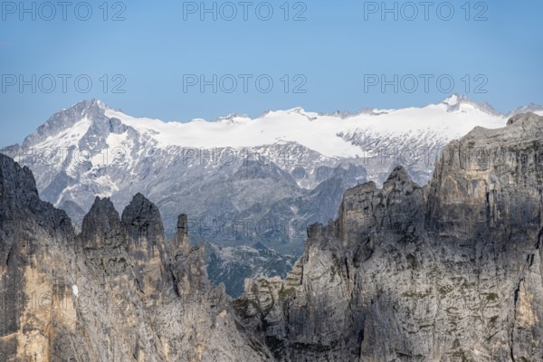 Adamello mountain peak with glacier, in front Brenta Mountains, Brenta-Adamello Natural Park, Trentino, Italy