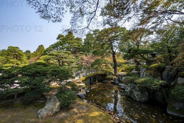Gonaitei Garden with Dobashi Bridge over a pond, Japanese Garden, Kyoto Imperial Palace, Kyoto, Japan
