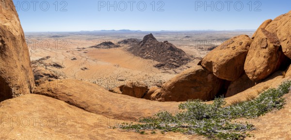 Rocks with a wide view over the dry landscape of Spitzkoppe, Spitzkoppe, Erongo, Namibia