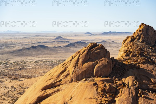 View of the vast, dry landscape of Spitzkoppe from the top of a rock, Spitzkoppe, Namibia