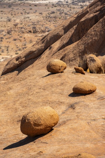 Sloping rocks and stones in a dry desert landscape, Spitzkoppe, Namibia