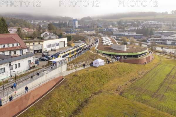 Panoramic view of a train with people in a hilly district during an event, opening of the Hermann Hesse Railway, Calw, Germany