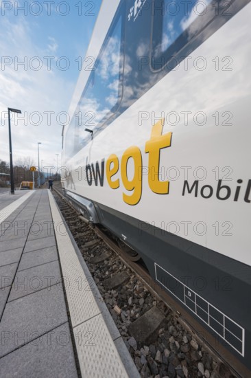 Close-up of a train with visible lettering on the tracks, opening of the Hermann Hesse Railway, Calw, Germany