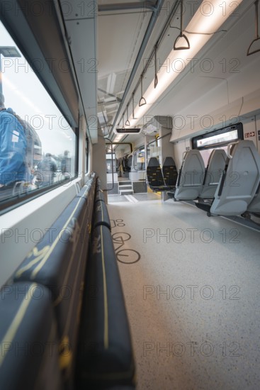 Interior view of a modern train with windows and folding seats, Siemens Micro Plus B battery electric train, Hermann, Hesse, Bahn, Weil der Stadt, Böblingen district, Germany