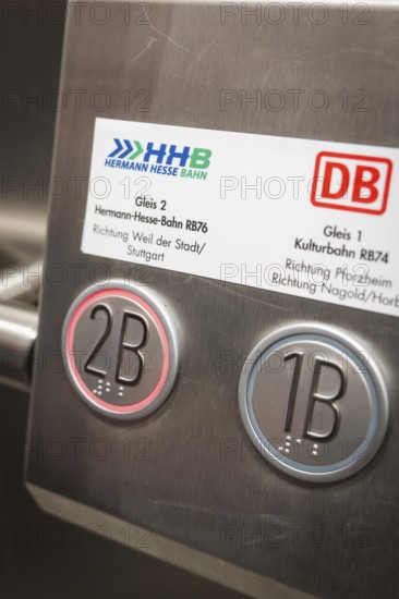 Close-up of track number plates and buttons in a train station, battery electric train Siemens Micro Plus B, Hermann, Hesse, Bahn, Weil der Stadt, Böblingen district, Germany