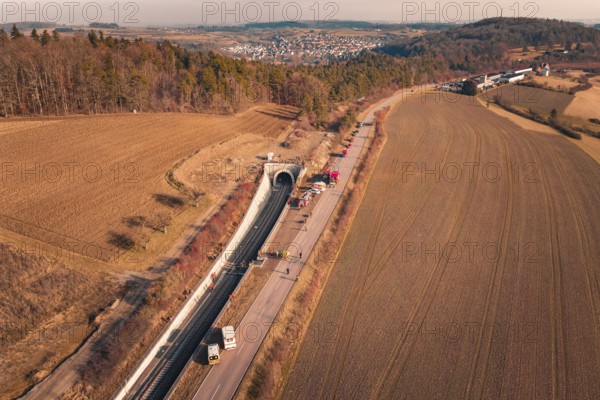 Tunnel with emergency vehicles and barriers along the road taken from the air, fire drill on the Hermann-Hesse-Bahn, Ostelsheim, Germany