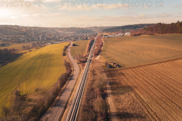 Aerial view of a rural area with fields, village and parallel traffic routes, fire drill on the Hermann-Hesse railway, Ostelsheim, Germany