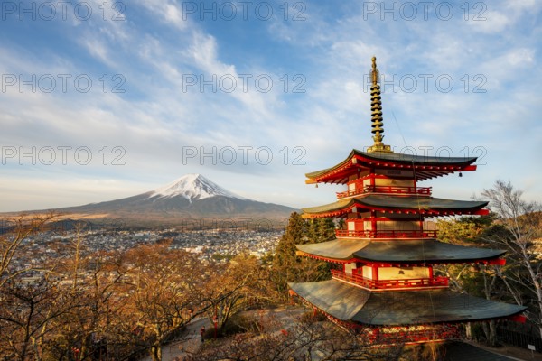 Five-story pagoda of a Shinto shrine in morning light, Chureito Pagoda, with views of Fujiyoshida City and Mount Fuji volcano at sunrise, Arakura Fuji Sengen Shrine, Arakurayama Sengen Park, Yamanashi Prefecture, Japan