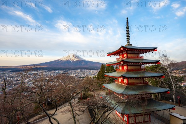 Five-story pagoda of a Shinto Shrine, Chureito Pagoda, with views of Fujiyoshida City and Mount Fuji volcano at sunrise, Arakura Fuji Sengen Shrine, Arakurayama Sengen Park, Yamanashi Prefecture, Japan