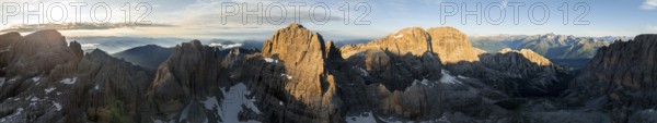 Impressive mountain peaks of the Brenta Mountains, sunrise, 360 degree alpine panorama, aerial view, Brenta, Brenta-Adamello Natural Park, Trentino, Italy
