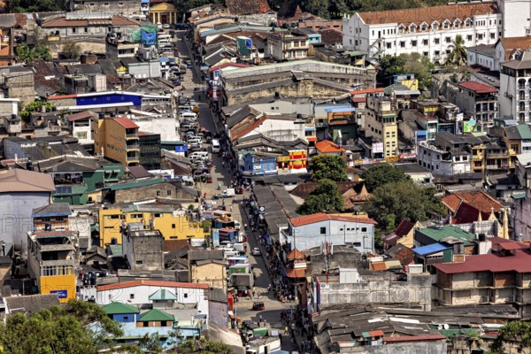 Bird's eye view of a city with colorful buildings, lively atmosphere and architecture, view of the city center of Kandy in Sri Lanka