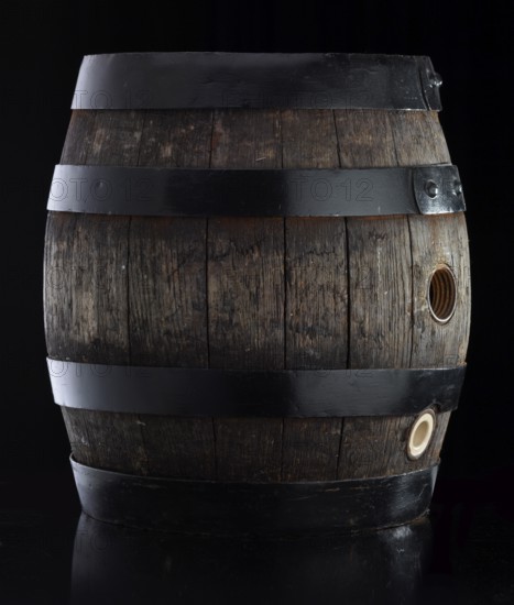 Beer keg against black background, studio shot against black background