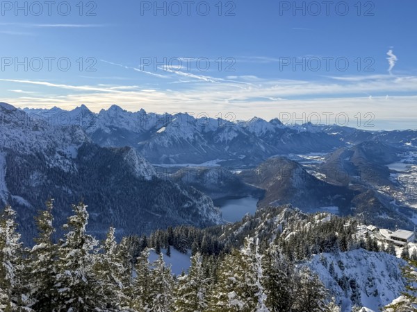 View of snowy mountain landscape of the Allgäu Alps with Alpsee, Tegelberg in winter, Schwangau, Allgäu Alps, Bavaria, Germany