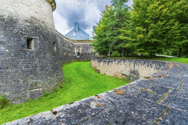 Exterior view of Mudam Luxembourg – Musée d'Art Moderne Grand-Duc Jean on the Kirchberg Plateau in the European Quarter of Luxembourg City, Luxembourg. Contemporary glass-and-steel architecture designed by I. M. Pei, photographed in daylight, showcasing clean geometric lines and modern cultural landmark in an urban business district