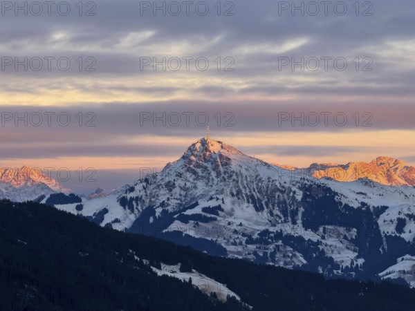Alpine glow at sunset, Kitzbühler Horn mountain peak in winter, Brixental, Kitzbühel Alps, Tyrol, Austria