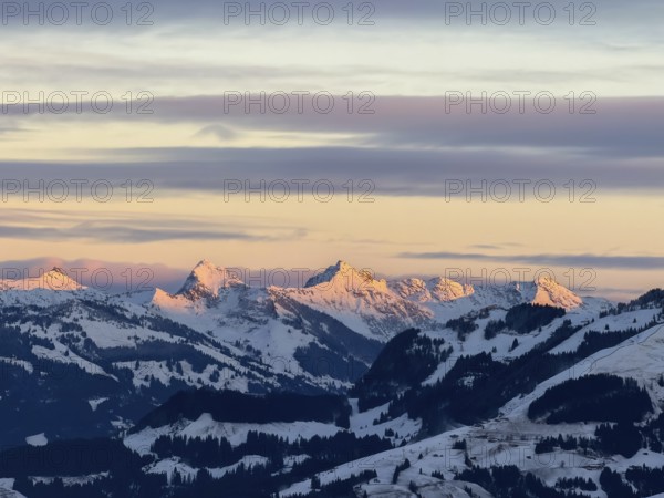 Alpine glow at sunset, mountain peaks in the Kitzbühel Alps in winter, Brixental, Tyrol, Austria