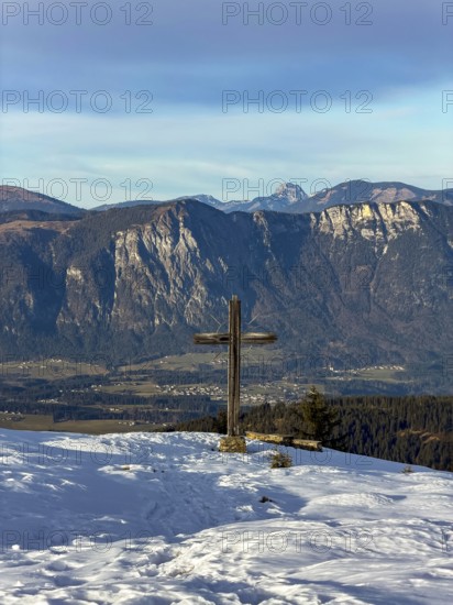 Rosskopf summit with summit cross in winter, view of Inn Valley, Kitzbühel Alps, Tyrol, Austria