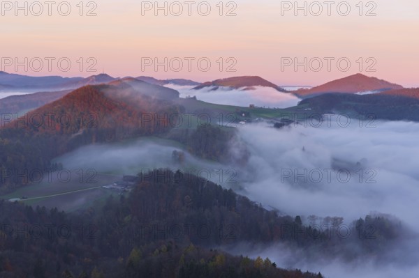 View from the Gisliflue of the Jura foothills covered in fog from the left, Wasserfluh, Summerholde, Asperstrihen, Strihen, in the morning light, Talheim, Canton, Aargau, Switzerland