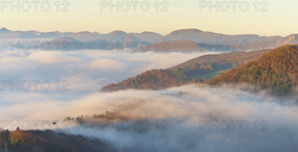 View from the Gisliflue of the Jura foothills covered in fog in morning light, Talheim, Canton, Aargau, Switzerland