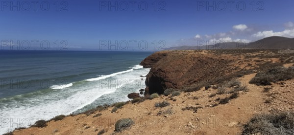 Rugged coastal land with views of the vast ocean and cliffs, Morocco