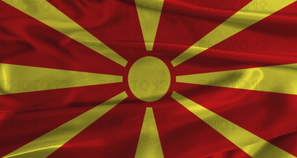 Flag of North Macedonia with fabric textured background. Close up of National flag of North Macedonia with realistic texture