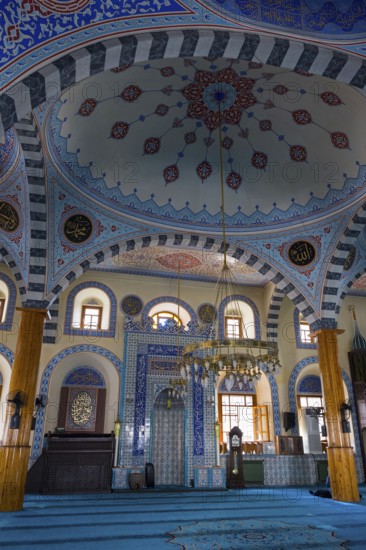 Traditional mosque interior with blue dome and ornate ornaments, spiritual atmosphere, Kapu Mosque, Ottoman era mosque, Konya, Central Anatolia, Turkey
