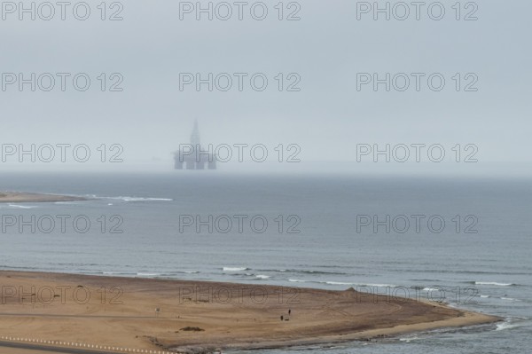 Hazy weather, oil rig near Walvis Bay, Namibia