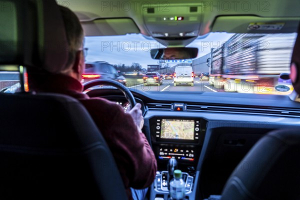 Driving on the A40 motorway, Ruhrschnellweg, in heavy traffic, drivers' perspective, Essen, North Rhine-Westphalia, Germany