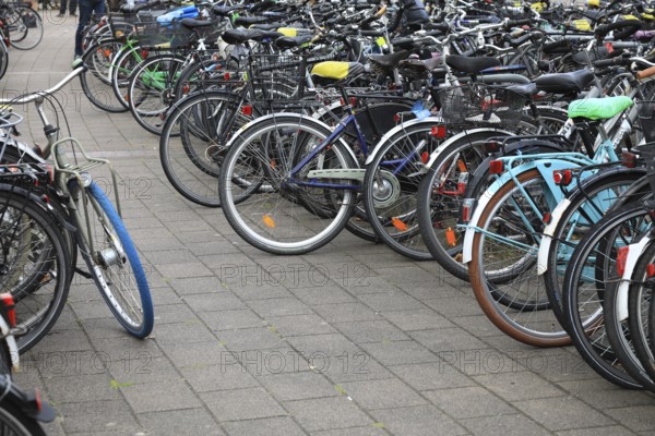 Lots of bikes in the bicycle parking lot in front of Oldenburg Central Station, Lower Saxony, Germany