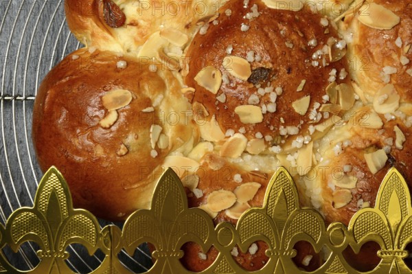 Epiphany cake with paper crown, Switzerland