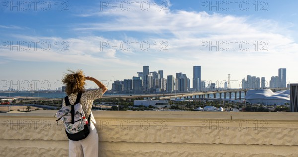 View of Abu Dhabi's skyline from the Zayed National Museum platform, the museum is the heart of the cultural district on Saadiyat Island, Abu Dhabi, United Arab Emirates