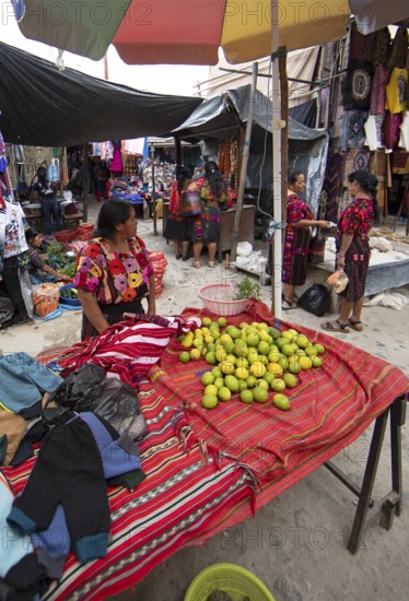 Mayan woman wearing traditional clothes at the market in Chichicastenango, Highlands, El Quiché Department, Guatemala