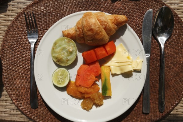 Rich breakfast at the hotel with fruits and vegetables, Ubud, Bali, Indonesia