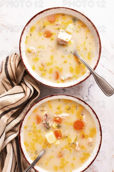 Finnish fish soup, lohikeito soup, creamy fish soup, two bowls of soup