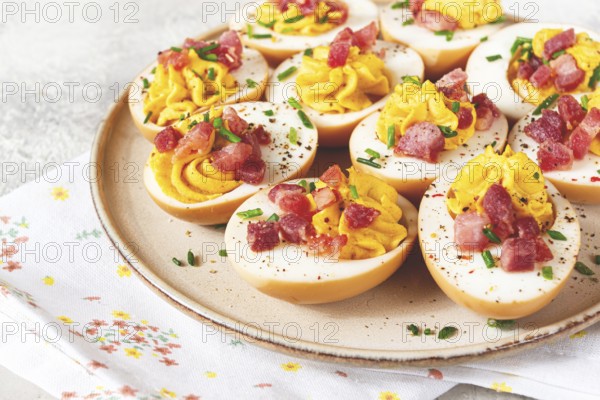 Spicy, stuffed ramen eggs, with bacon and green onions, homemade, no people