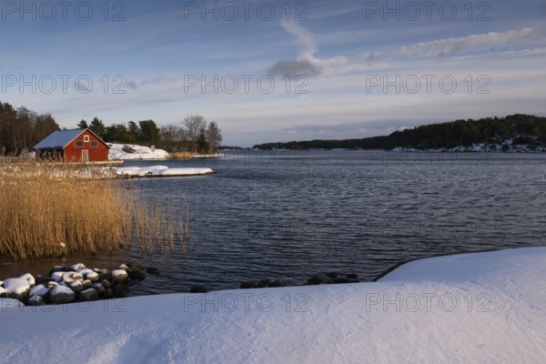 Boathouse, snowy archipelago landscape, sea, Korpoström, Korpo or Korppo, southwestern archipelago, Finland