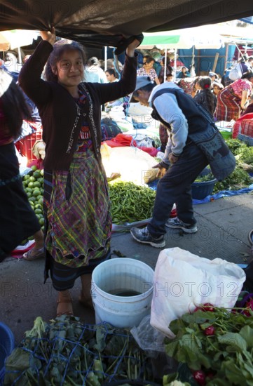 Mayan woman wearing traditional clothes at the market in Sololá, Highlands, Sololá Department, Guatemala