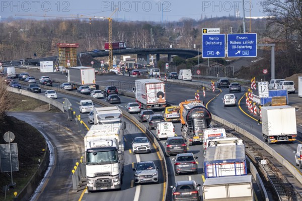A3 motorway at the Duisburg-Kaiserberg interchange, constricted lanes, heavy traffic, complete conversion and construction of the A3 and A40 intersections, all bridges, ramps, roads are renewed and partly extended, 8-year construction period, railway bridges running there will also be renewed, North Rhine-Westphalia, Germany
