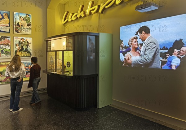 Cinema from the 1950s as a presentation with movie posters, box offices and original films, House of History, Bonn, Germany