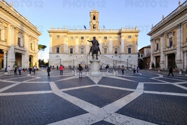 Equestrian statue of Marcus Aurelius in front of the Senatorial Palace (Palazzo Senatorio) in the evening light, Piazza del Campidoglio on the Capitoline Hill, Capitoline Square, Rome, Lazio, Italy