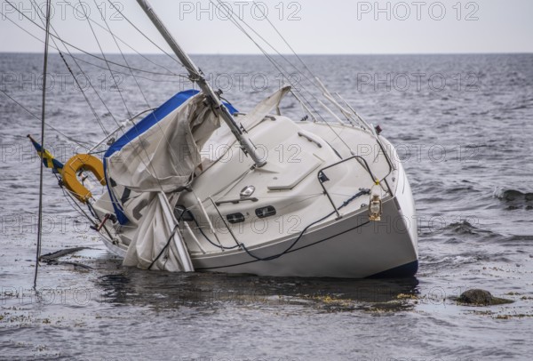 Wrecked sailboat on the coast of Ystad, Skåne County, Baltic Sea, Sweden, Scandinavia