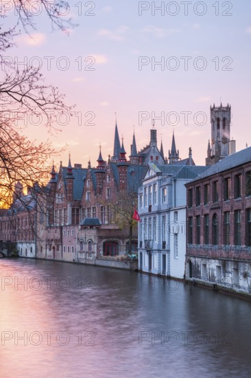 Bruges. Belgium. Flanders. Houses in the historic district overlooking a canal. UNESCO