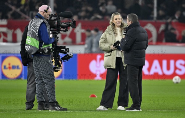 RTL TV expert Lothar Matthäus interviewed with reporter presenter Laura Papendick microphone micro logo TV camera soccer, UEFA EUROPA LEAGUE, MHPArena, MHP Arena Stuttgart, Baden-Württemberg, Germany