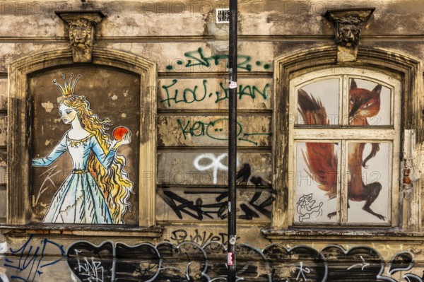 Street art on the wall of a building in the Kazimierz Jewish Quarter, a historically significant, formerly independent district that developed into an important center of Jewish culture since the 14th century, Krakow, Poland