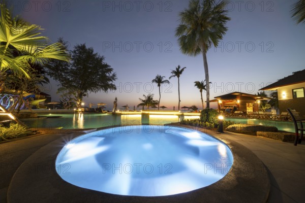 Illuminated swimming pool on Koh Chang Island, Andaman Sea, Southern Thailand, Thailand