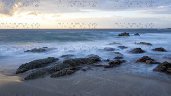 Sunrise on the beach, coast near Sadah, Oman