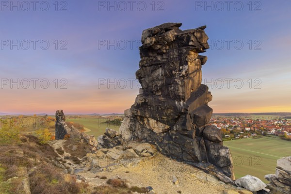 Teufelsmauer, Devil's Wall at sunrise, eroded sandstone rock formation Mittelsteine near Weddersleben in the Harz Mountains, Saxony-Anhalt, Germany