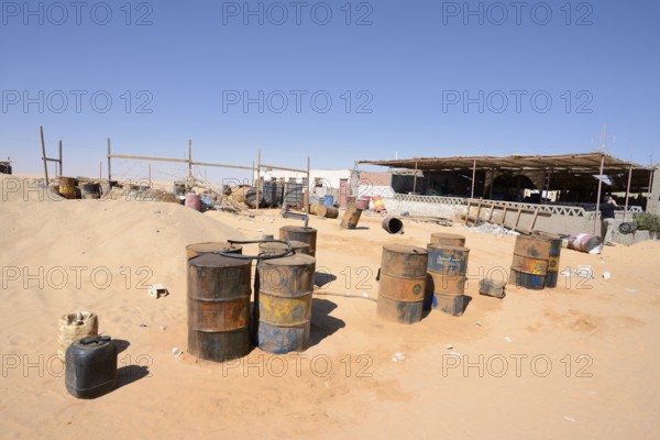 Empty kerosene barrels at a gas station in the Arabian Desert, Egypt