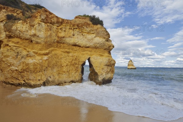 Rocky coast and beach, Praia do Camilo, Lagos, Algarve, Portugal